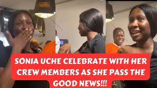 SONIA UCHE celebrate for joy while on set with her crew members.