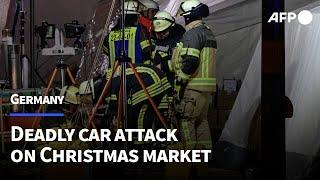 Rescue workers at scene of deadly car attack on German Christmas market | AFP