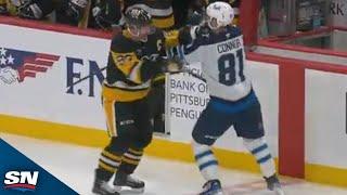 Penguins' Crosby and Jets' Connor Exchange Punches in Unlikely Tilt