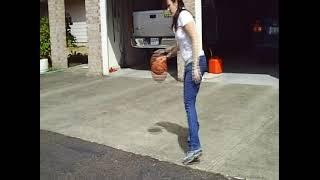 Joy Scout Maria Shooting Hoops in the Driveway