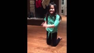 Granddaughter showing us her dance routine for class