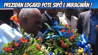 Aksyon sa pase miragwàn!  Prezidan Edgard Leblanc debake ak yon jèb flè vin depoze nan memwa viktim