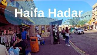 Travels by bus to Haifa Hadar and walks in the neighborhood