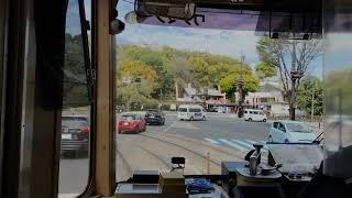 Riding the tram to Kumamoto Castle