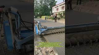 Road Paver in Operation: Paving the Way for Progress