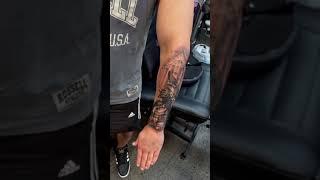 Tattoo Artist Inks Gladiator's Tattoo On Person's Arm - 1280113-4