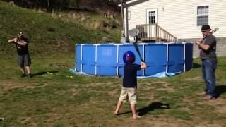 Young Boy Hits Baseball Into Man's Face