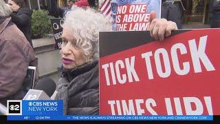 Small group protests outside Trump Tower in support of indictment