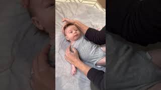 Left lateral tilt stretch for torticollis - Fit Family Littles - Pediatric Physical Therapy