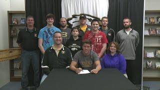 Beau Barkley signs with Defiance College football and golf.