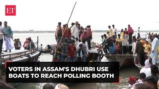 LS Polls 2024: Locals of Assam’s Dhubri use boats to arrive at the polling booth to cast votes