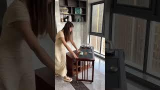 A rotatable and foldable small tea table that can be placed anywhere on the balcony or living