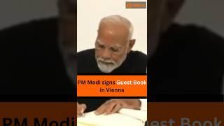 PM Modi signs Guest Book in Vienna