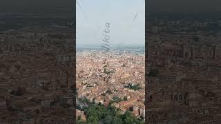 Vertical video. Bologna, Italy. Old Town. Panoramic view of the city. Summer, Aerial View