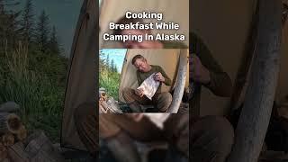 Cooking Breakfast While Camping In Deep Alaska Mountains