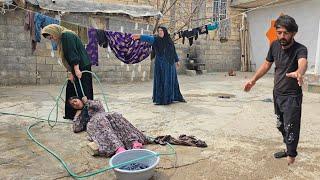 The first wife wants to wash Pourya's clothes, but the second wife is jealous and doesn't want to.