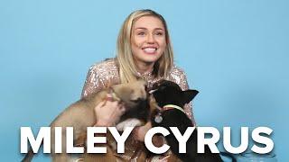 Miley Cyrus Plays With Puppies (While Answering Fan Questions)