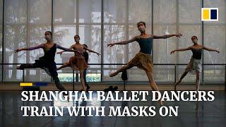 Masked ballet dancers in Shanghai pirouette and plie amid coronavirus epidemic