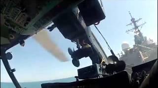 Ukrainian Ka-27 Helix helicopter Conducts Flight Ops with USS Ross