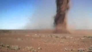 Crazy Guy Runs Into Outback Tornado To Take Selfie!