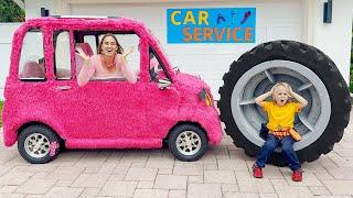 Chris helps Mom take care of pink car