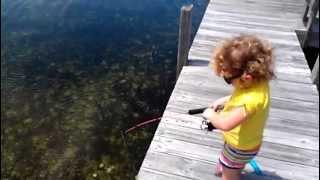 2 year old catches her first fish. I gotta shish!