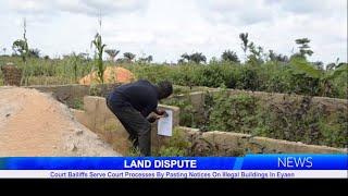 Land Dispute: Court Bailiffs Serve Court Processes By Pasting Notices On Illegal Buildings In Eyaen