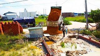 Start New Project Pouring soil into the house construction site Using the best Old Bulldozer & Truck