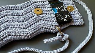 A handbag for a phone with a crocheted zigzag pattern. Crochet...