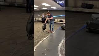 Man rides scooter luggage. #travel #airport #adventure