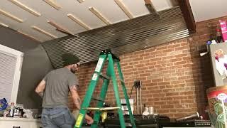 Installing the corrugated steel ceiling