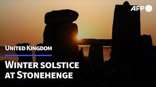 Thousands greet the sun at Stonehenge to celebrate winter solstice | AFP