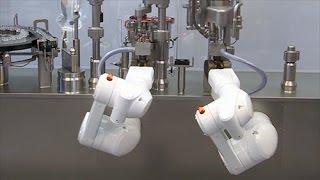 Filling and closing machine for small batches with Stäubli TX60 stericlean robots