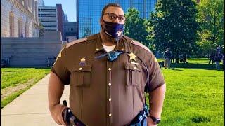 Cop in Indianapolis goes insane over men with cameras refusing to wear a mask (EPIC FAIL)