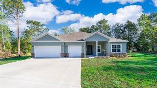 Moving to Ocala? 4 bedroom 3 bath 3 car garage approx 2400 Sq. Ft.