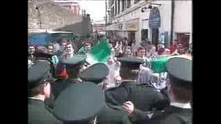 RUC raid on Derry Sinn Fein Centre.Mary Nelis and others arrested.