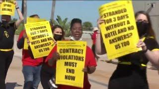 Employees with Spirit Airlines protest at Orlando International Airport