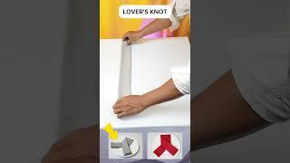 LOVER'S KNOT DOLD TABLE NAPKIN #napkin #diy #napkinart #tutorial #napkinfold #napkinorigami