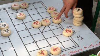 Chinese Chess (Xiangqi) in Xi'an, China, played on the street