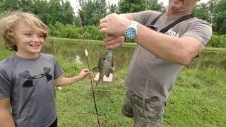 Hidden Gem Unveiled: Grandson's Fishing Triumph in Secret Pond Adventure! Catching his 2nd bass ever