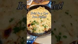 Brie cheese in a cast-iron skillet! ￼See what they put in it.see more www.fatchefrestaurantguide.com