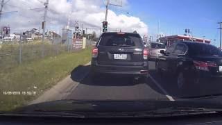 Overton rd Rail Xing again, red arrow and boom gates