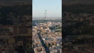 Vertical video. Rome, Italy. View of the Vatican. Dome of the Basilica di San Pietro, Flight over...