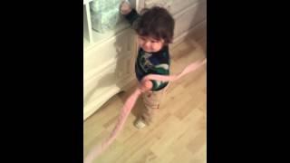Arslan playing with robe belt