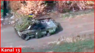 The joy of Ukrainian fighters capturing Russian armored vehicle in Ugledar -They wave Ukrainian flag