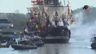 Tampa holds annual "Gasparilla Pirate Festival" including parade of pirate-themed ships