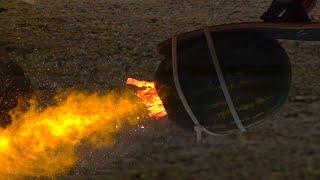 Rocket-Propelled Skateboard using a Melon - The Slow Mo Guys