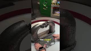 This exhibit showcases a magnetic tool that reveals how metal particles react to magnetic fields