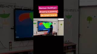 Naman Naithani of Special Wing Drawing & Painting on the SmartBoard without outline.Great work dear.