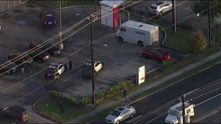 Shots fired during robbery of armored truck in S Houston; suspects at large